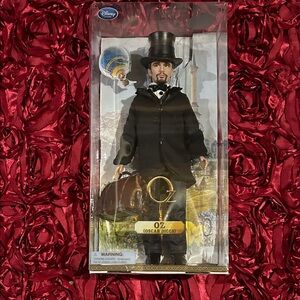 Disney Oz Doll with Black Coat